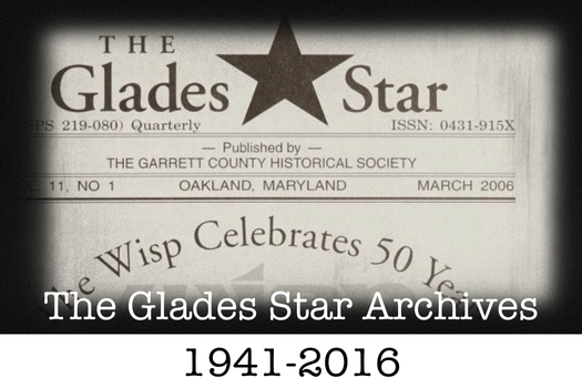Photo of The Glades Star newspaper with faded background