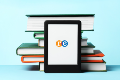 Stack of books with tablet device and RE logo