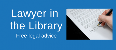 Lawyer in the Library with hand signing document